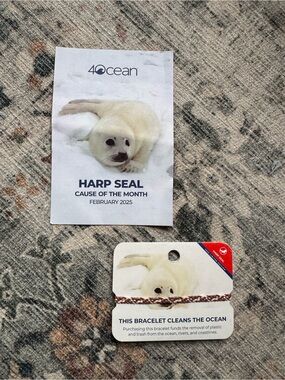 4ocean Harp Seal Charity Bracelet - White & Red Braided
